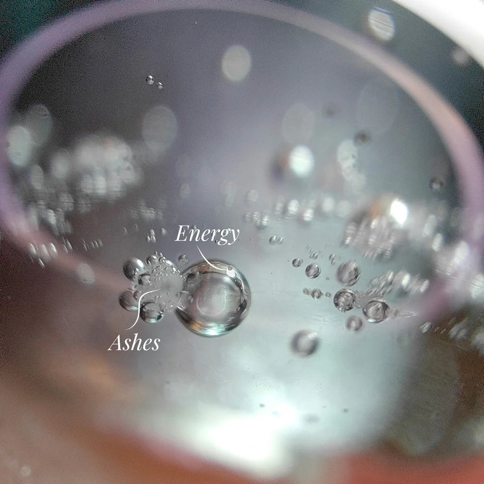 Unique carbon energy patterns in memorial glass jewelry, preserving the last breath and essence of your loved one.