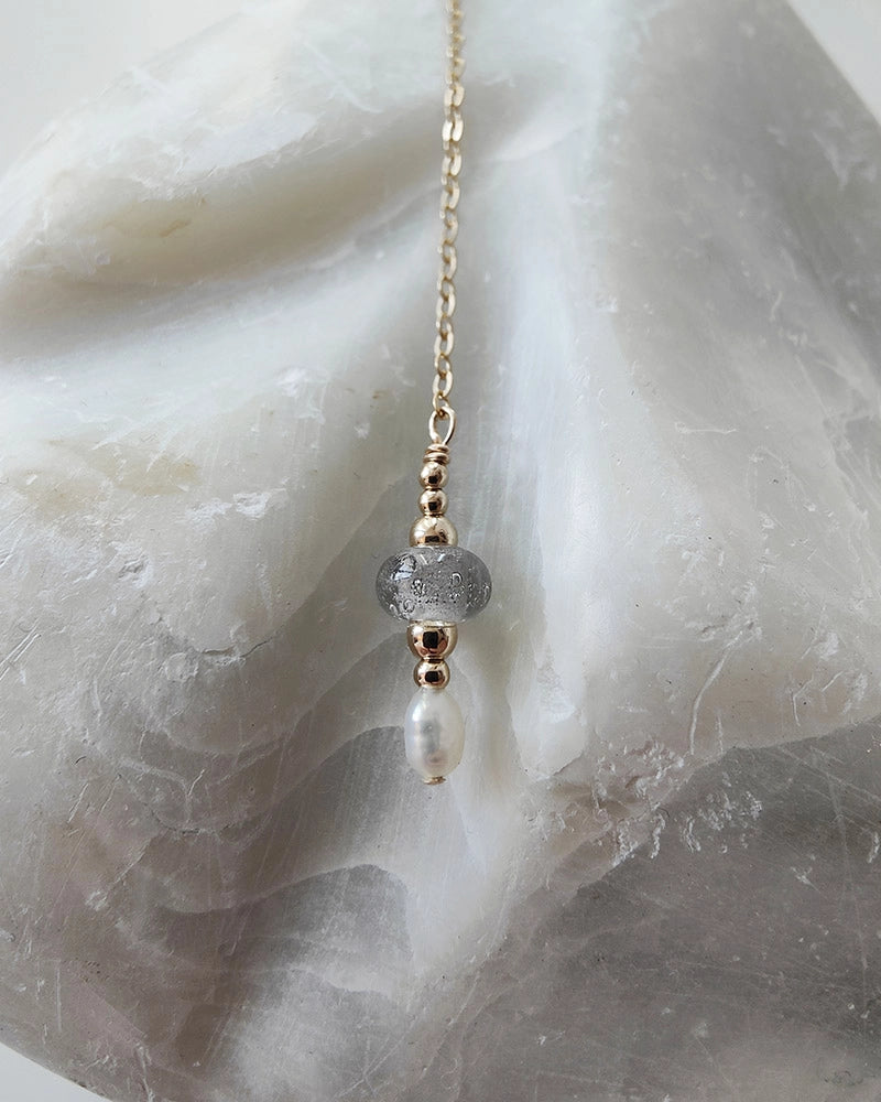 Memorial ketting met details van as en haar in glas