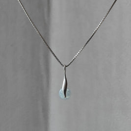 gedenkketting met as in Italiaans glas
