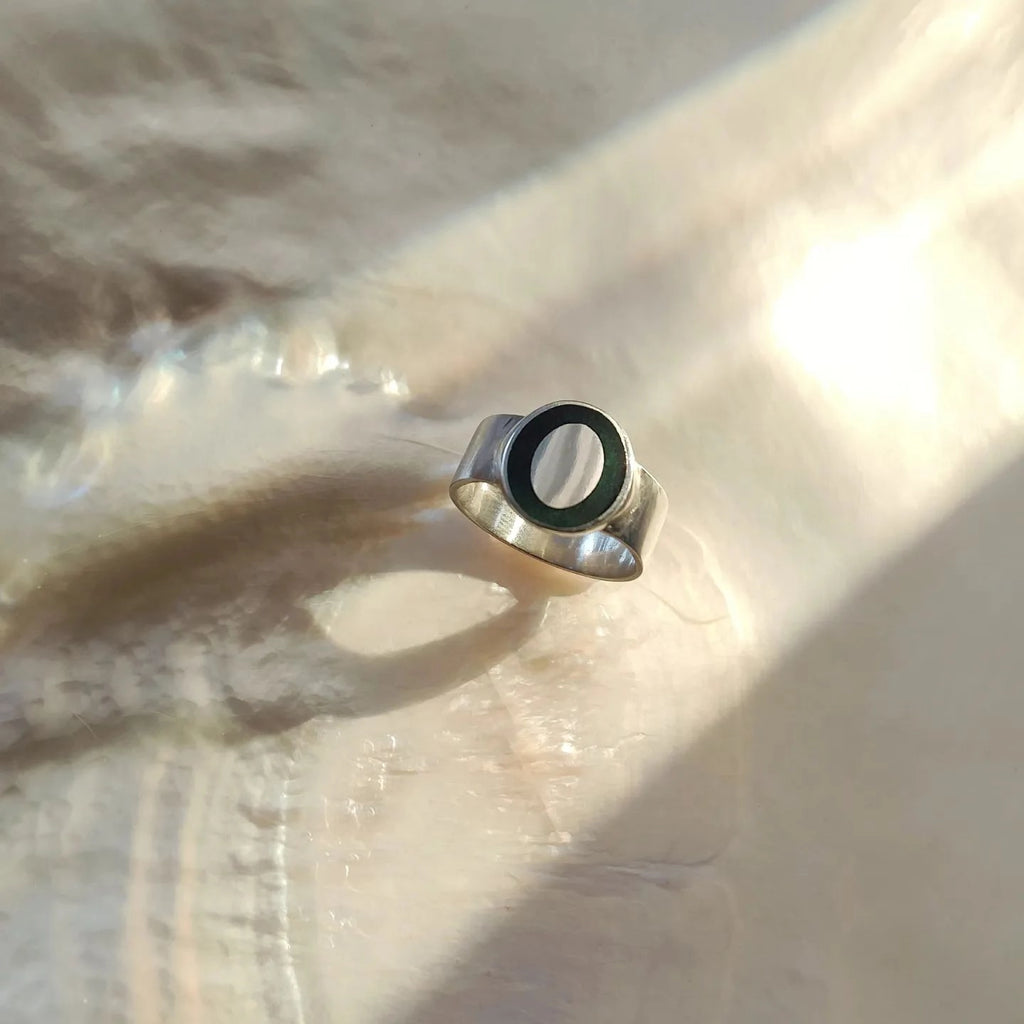 herdenkingsring met as en haar