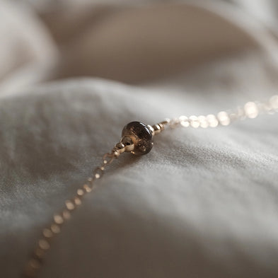 closeup van as in ketting handgemaakt verwerkt in Italiaans glas