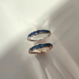 minimalistisch assieraad voor dagelijks dragen met blauwe golf